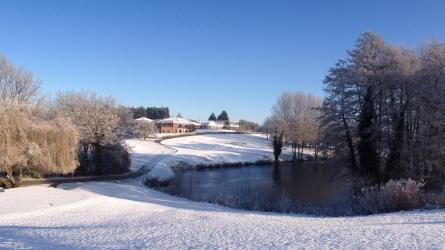 View of the Stoke by Nayland Resort in snowy Constable Country, from the 18th tee Credit: Stoke by Nayland Resort Caption: