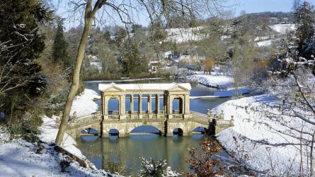 The Palladian Bridge at Prior Park Landscape Garden, Bath under a dusting of snow (c) National Trust Images /Philip Pierce