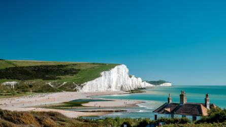 The cinematic walk along the Seven Sisters is as iconic as it is dreamy. Photo: Rachapol/Getty Images/iStockphoto
