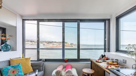 Sit back and enjoy the view from the comfort of the living room. Photo: Marsdens Devon Cottages
